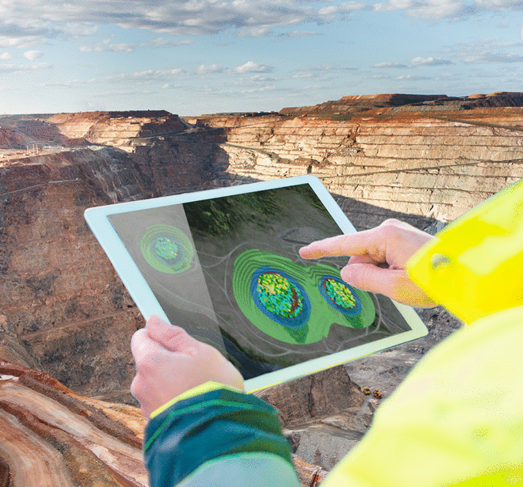 Person using tablet with mine in background